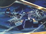 Breaking through reinforced glass